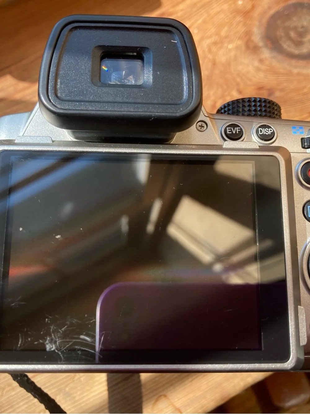 Pentax Black and Silver SLR Camera Body with Pentax Lens Cap
